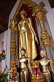Thailand, Phra Pathom Chedi, the nation's largest pagoda in Nakorn Pathom. Buddha statue in one wiharn of the outer couryard. 
